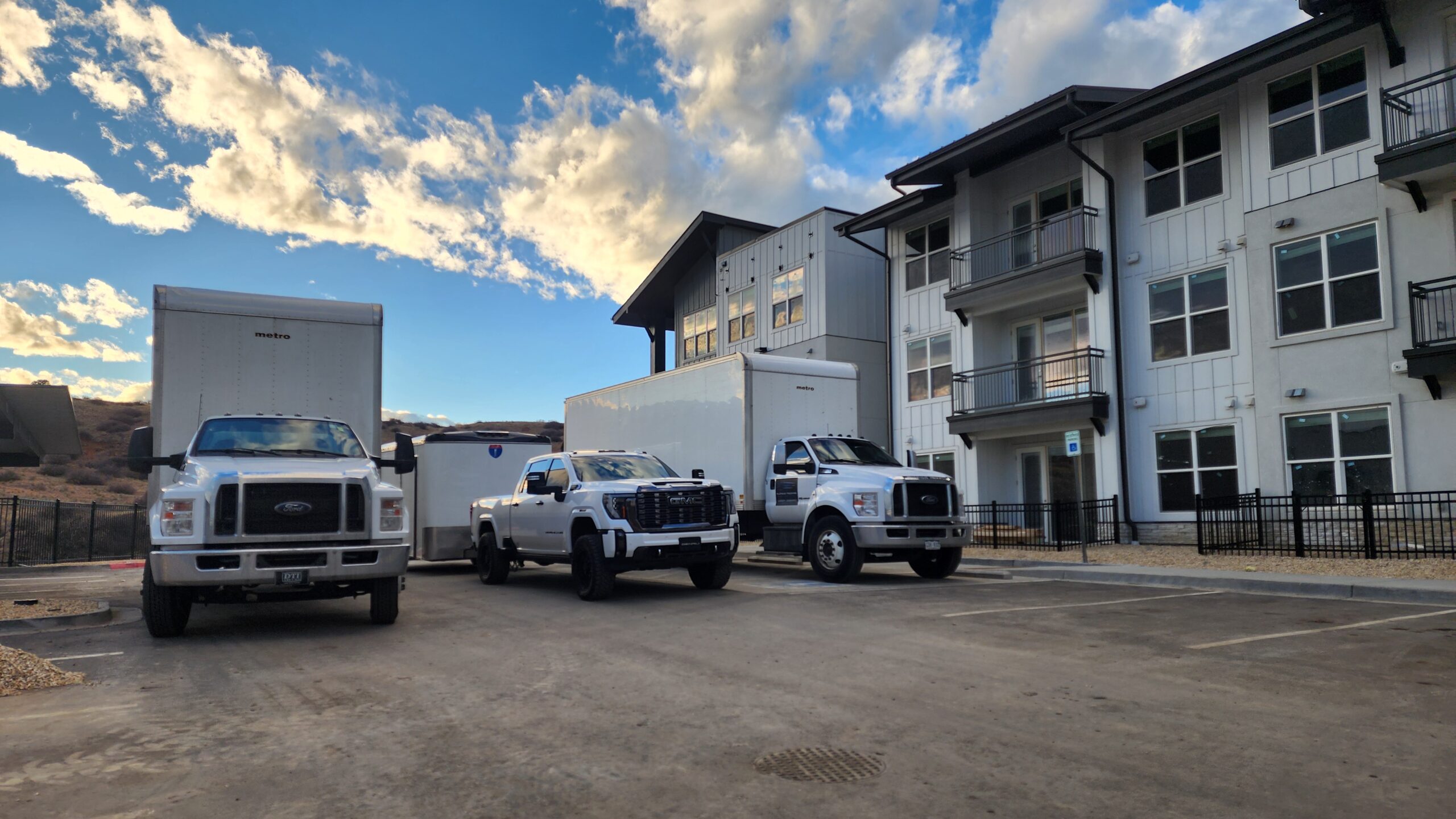 AKK fleet trucks staged at a job site
