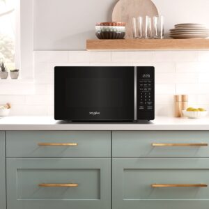 Whirlpool 0.7 Cu. Ft. Countertop Microwave with Steam Clean and 700 Watt Cooking Power view 9